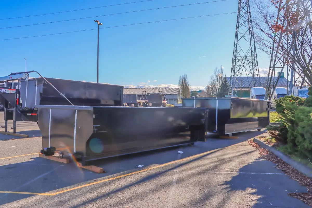 Roll-off dumpster ready for waste disposal at job site for Roofing Dumpster Rental in Burlington